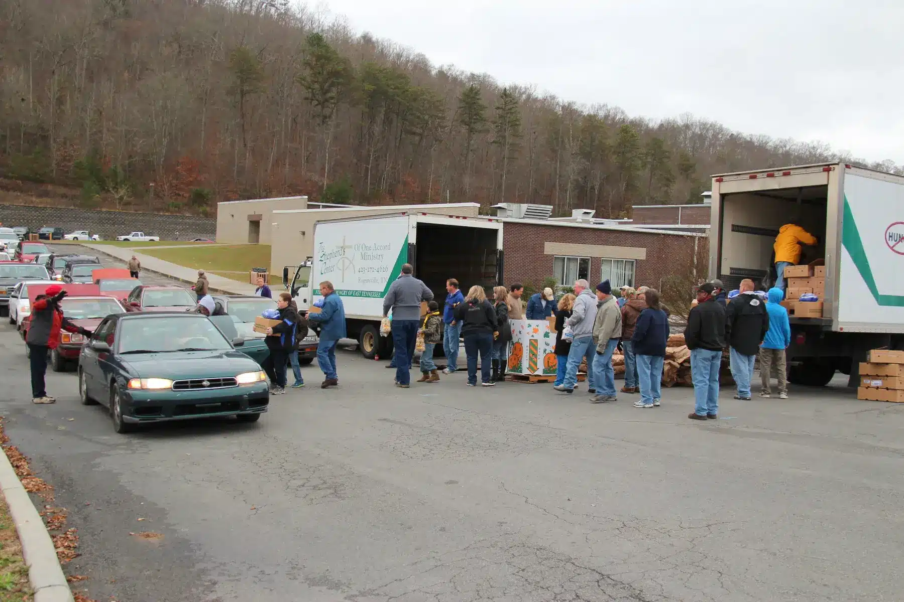 A food distribution operation serving a line of vehicles