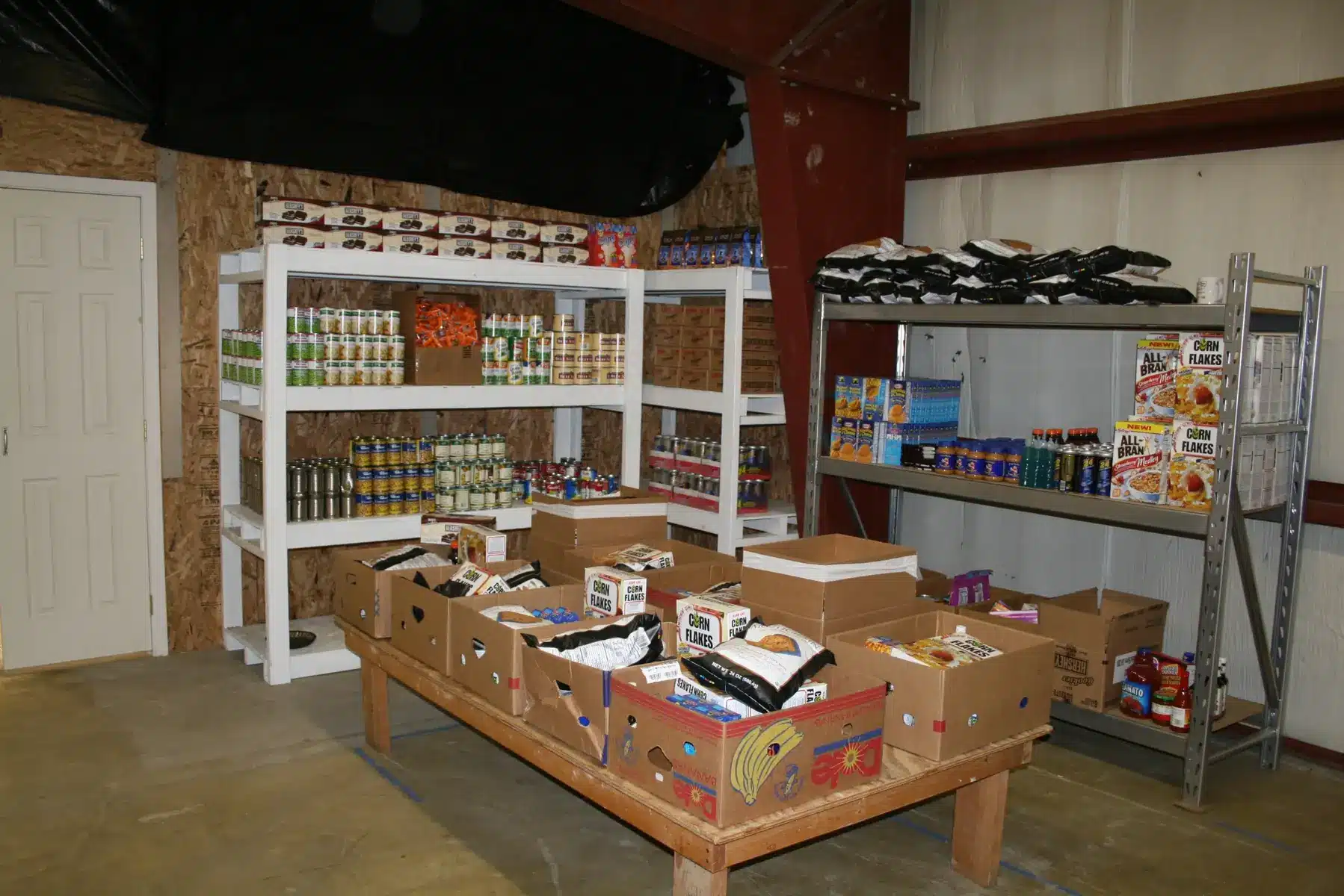 Food pantry shelves prepared to serve local families