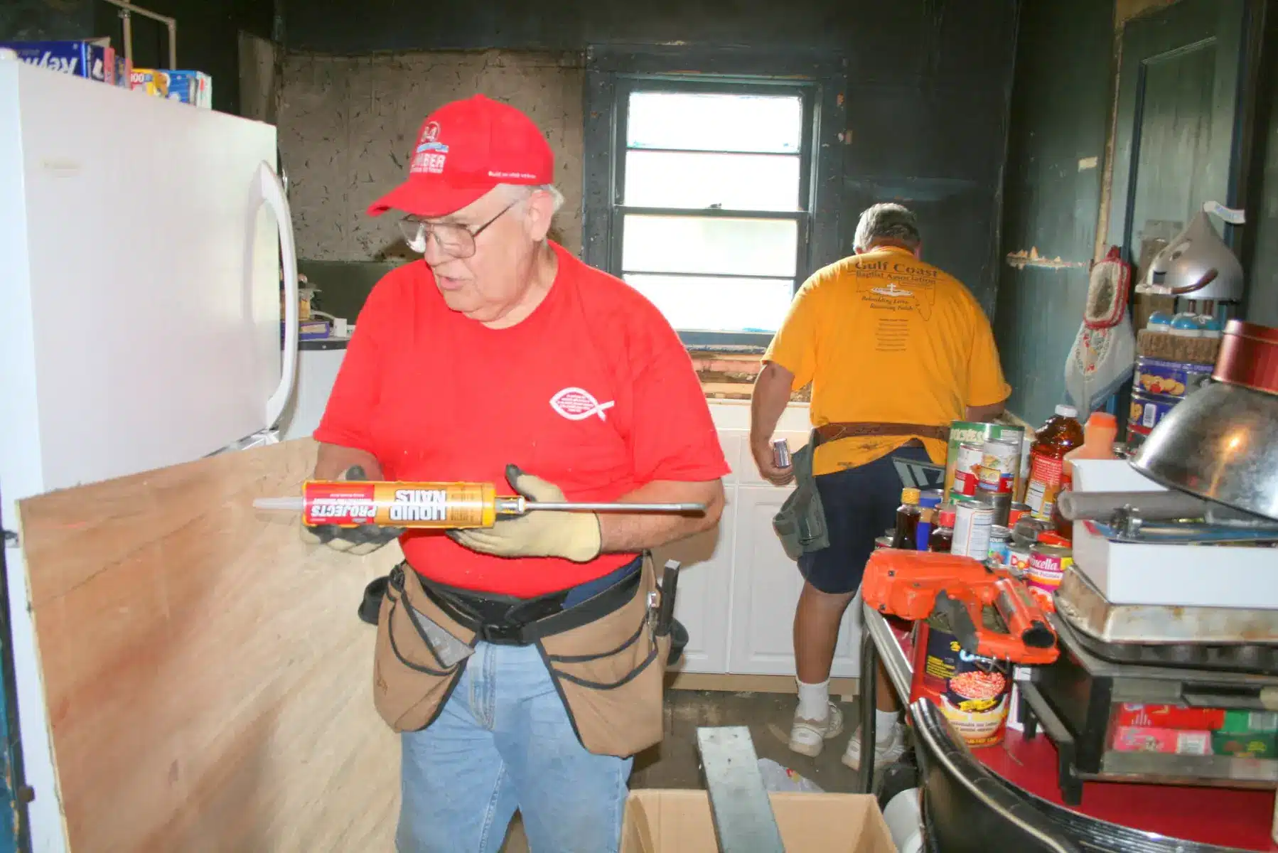 Volunteers completing interior repairs